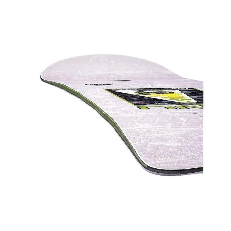 A close-up of a snowboard deck showing a light gray and white marbled pattern, a green edge, and a graphic with black, green, and yellow graphics.
