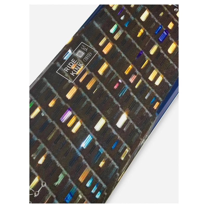 A close-up of a hair color swatch chart or display card showing multiple strands of hair in different shades, including dark brown, black, blonde, blue, purple, and green, with a visible 'RUDE KNIFE' label.