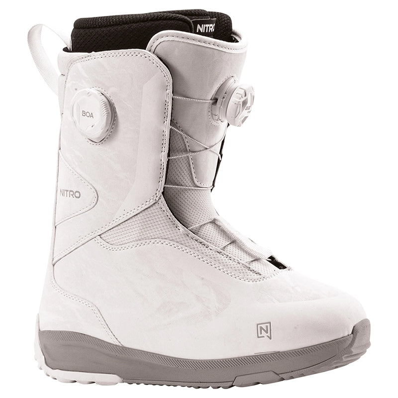 A white and gray Nitro snowboard boot with a BOA dial closure system, shown from a side profile on a white background.
