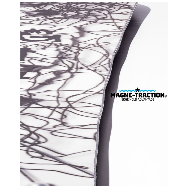 A close-up of a white fabric surface with a black abstract scribble pattern, folded over to show a dark gray underside, with the MAGNE-TRACTION Edge Field Advantage logo printed on the white side.