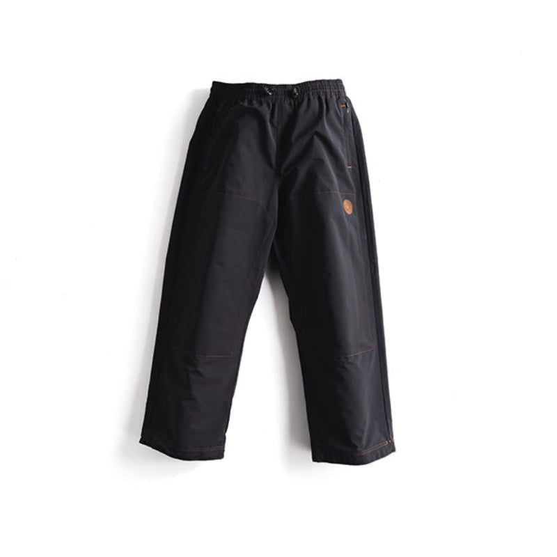 Black wide-leg snow pants with an elastic waistband and a small orange circular logo on the upper left thigh, shown against a plain white background.