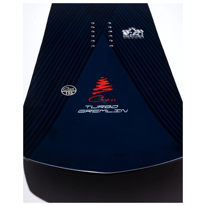 Close-up of the tail section of a snowboard, showing a dark navy blue base with black carbon-look striping, a red tree logo, and white text reading 'Gnu Turbo Gremlin'.