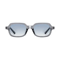 Sunglasses with a clear frame and blue gradient lenses on a light gray background