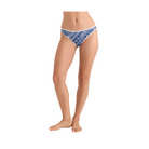 A model's lower body wearing a blue and white patterned thong bikini bottom with white trim, shown against a light pink studio background.