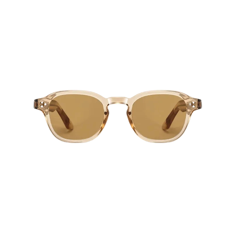 A pair of round-frame sunglasses with translucent warm beige frames and brown-tinted lenses, shown from the front on a light gray background.