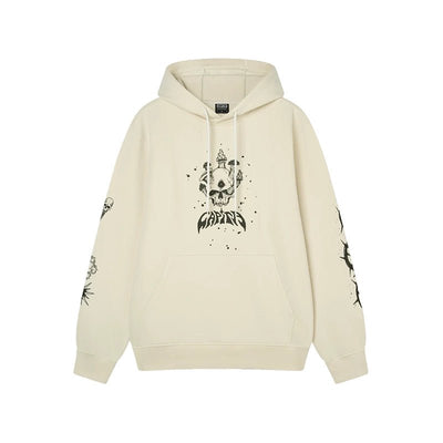 An off-white pullover hoodie featuring a black graphic print of a skull wearing a crown on the chest, with additional skull and thorn designs printed on both sleeves. The brand name 'BURNOUT' is visible on the chest graphic.