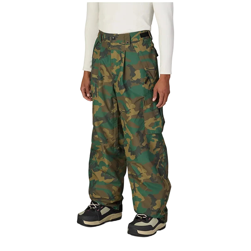 Model wearing camo wide leg pants