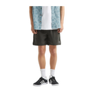 A model from the waist down wearing black athletic shorts, a white t-shirt, a light blue tie-dye button-up shirt, white socks, and black sneakers with white stripes.