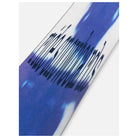 A close-up of a product featuring a blue and white tie-dye pattern with a black graphic of arrows pointing upwards, set against a plain white background.