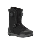 A black Ride snowboard boot with a dial closure system, shown from a three-quarters angle against a light gray background.
