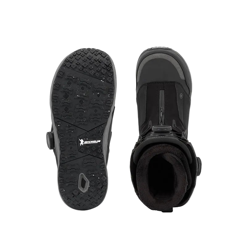 A pair of black Michelin snowboard boots shown from the top and bottom on a light gray background.