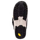 Top-down view of a shoe sole showing a black treaded outsole with a white textured center section and a small yellow Vibram logo near the heel, on a white background.