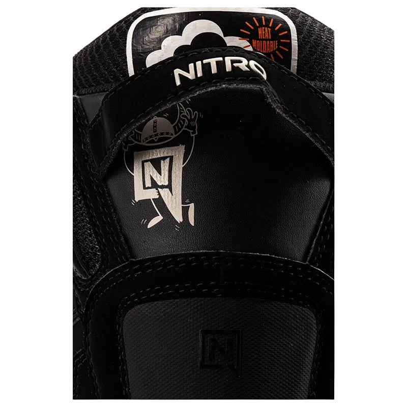 Close-up of a black athletic shoe showing the inner side with silver and white branding, including the word 'NITRO' and a stylized 'N' logo.