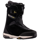A black Nike snowboard boot with 'TEAM PRO' and 'TLS' branding, featuring a black and white sole with a small yellow Vibram logo, shown against a plain white background.