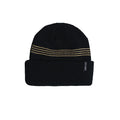 A black ribbed knit beanie hat with three horizontal gold dotted stripes across the upper portion and a small black brand tag on the folded cuff, shown against a plain white background.