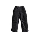 Black cargo pants with multiple utility pockets, laid flat on a light gray background.