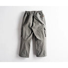 A pair of gray cargo pants with an elastic waistband, laid flat against a light gray background.