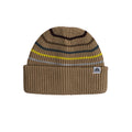 A brown ribbed knit beanie hat with horizontal stripes in black, dark blue, yellow, and light blue, featuring a small white embroidered logo patch on the cuff.