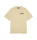 A light beige short-sleeve t-shirt with a small black and white 'CAPiTA' box logo printed on the left chest, displayed on a clean white background.