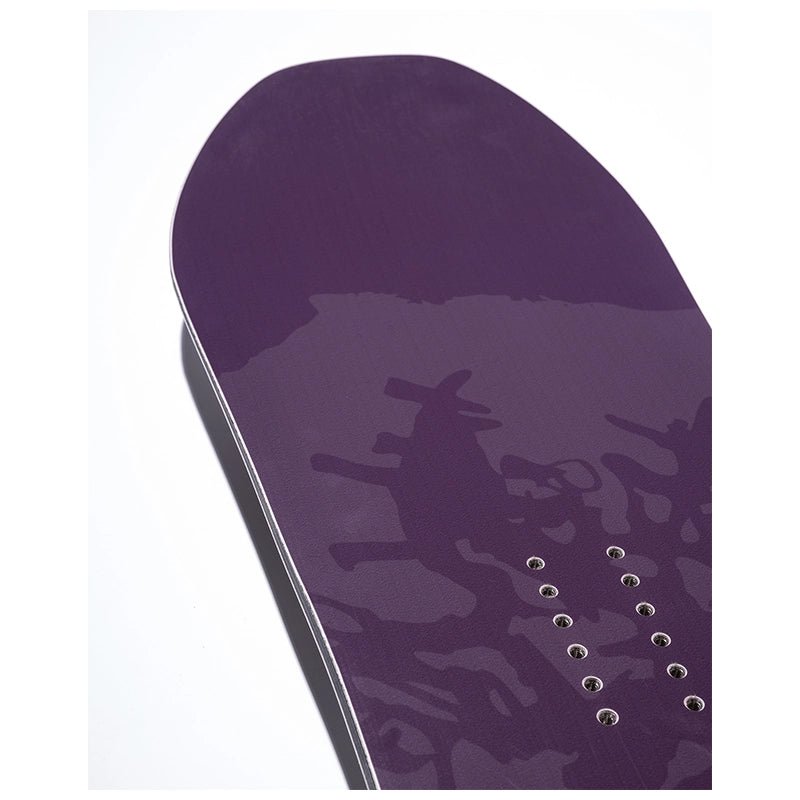 Close-up of a purple snowboard base showing the glossy finish, graphic pattern, and binding hole area against a white background.