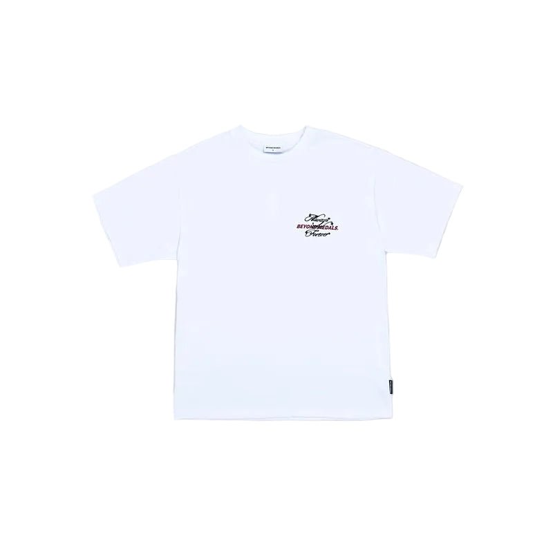 A white short-sleeve crewneck t-shirt with a small black graphic print on the left chest, displayed flat against a solid gray background.