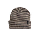 A black and beige patterned knit beanie hat with a folded cuff, shown against a plain white background.