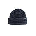 A dark navy blue knit beanie hat with a small white embroidered logo on the folded cuff, shown against a plain white background.