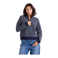 A woman modeling a navy blue and white striped quarter-zip knit sweater with a stand-up collar, paired with blue jeans, against a solid white background.