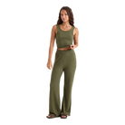 A woman modeling a matching ribbed knit two-piece set consisting of a cropped tank top and wide-leg pants in olive green, shown against a plain white background.