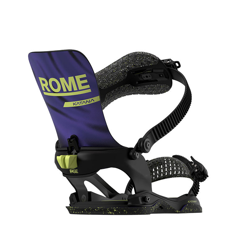 A single snowboard binding shown on a plain white background. The binding has a dark purple front pad with lime green 'ROME' and 'KATANA' text, a black frame and straps, and small yellow-green speckling on parts of the base and straps.