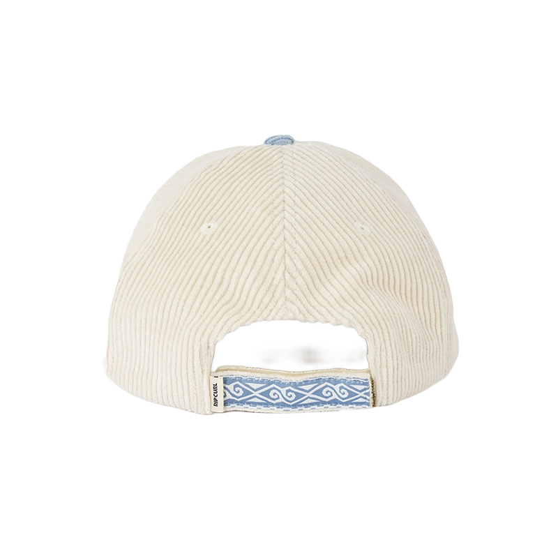 The back of a cream-colored corduroy baseball cap with a light blue patterned strap and a matching light blue button on top.